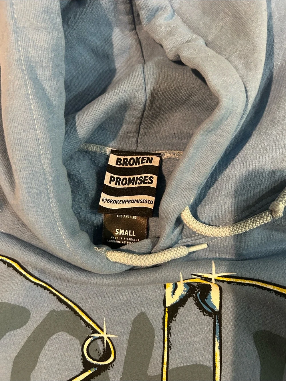 NWOT Broken Promises Piercer Blue Hoodie